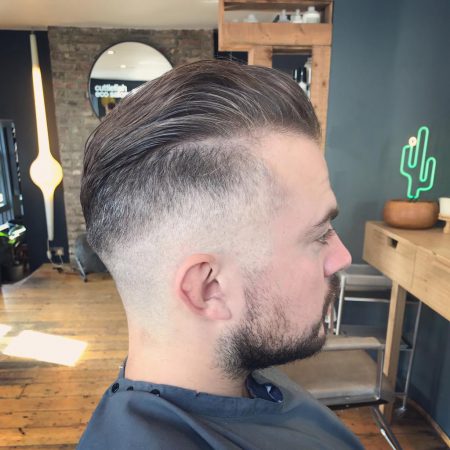 Men's side profile fade cut by Stu Weller